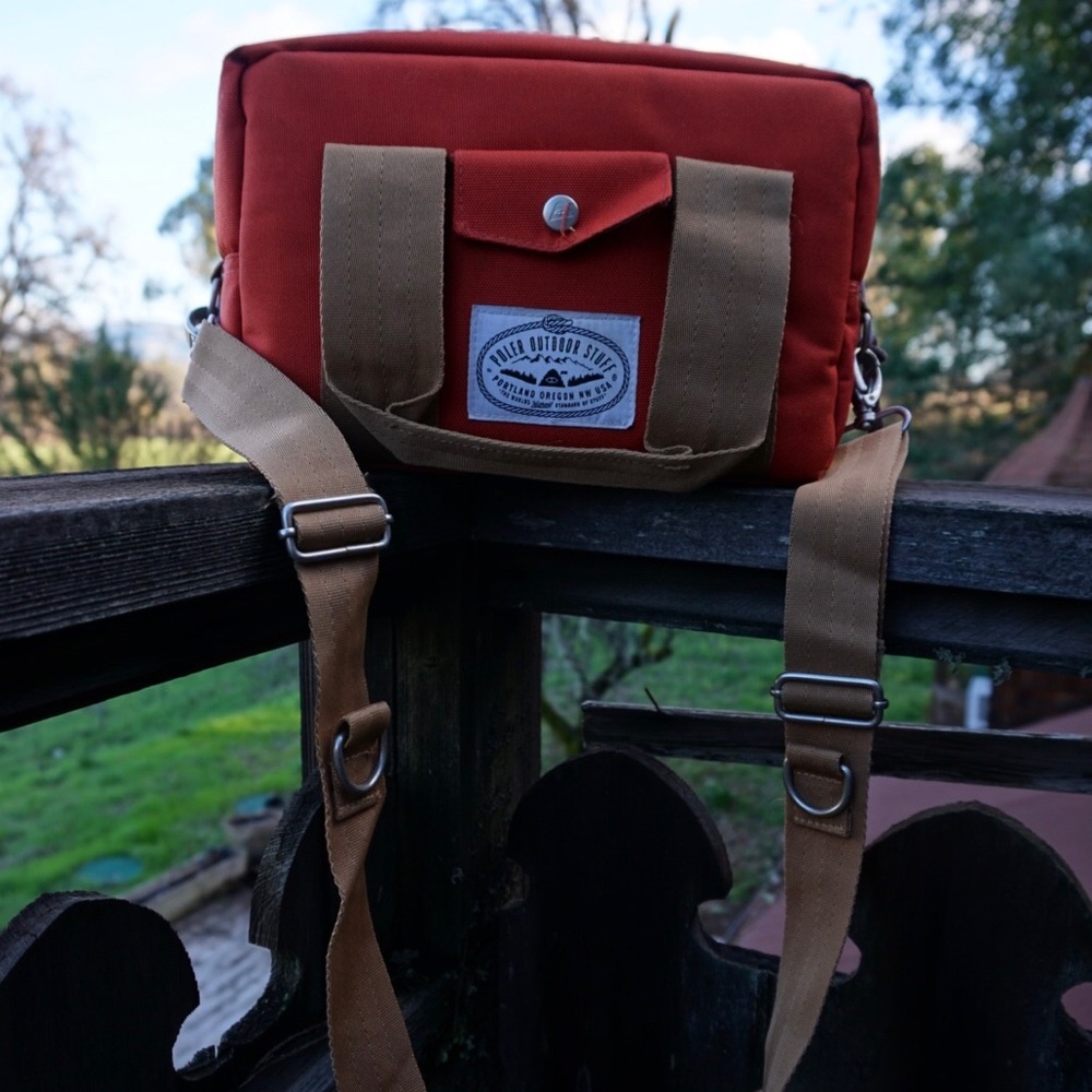 POLER stuff camera cooler in burnt orange